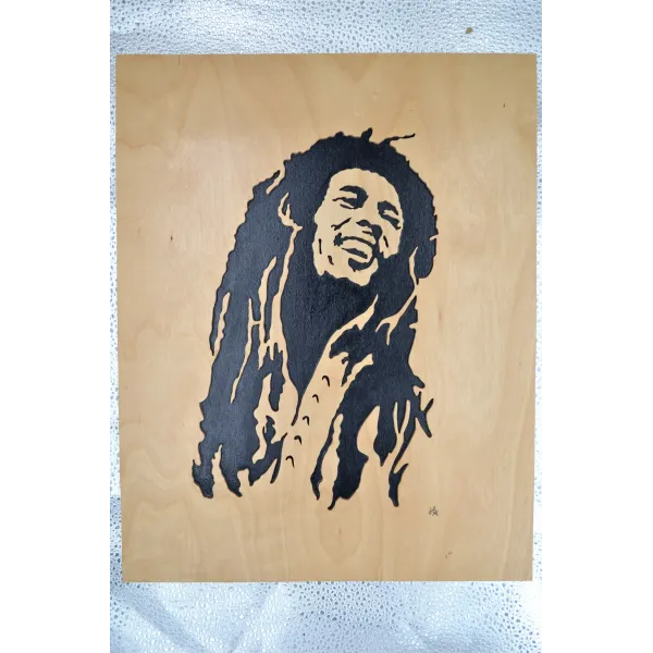 Tableau Bob Marley chantourné.