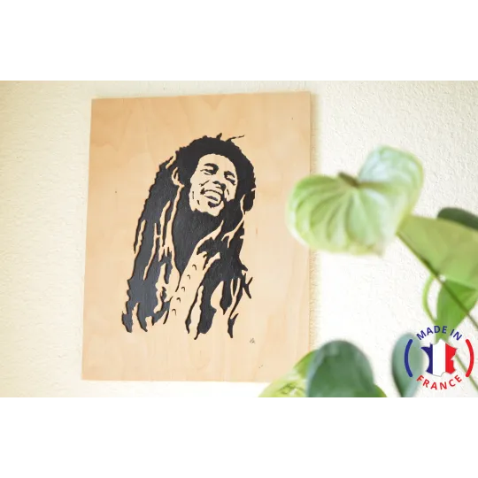 Tableau Bob Marley chantourné.