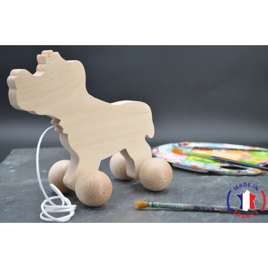 Raw wooden dog to pull.