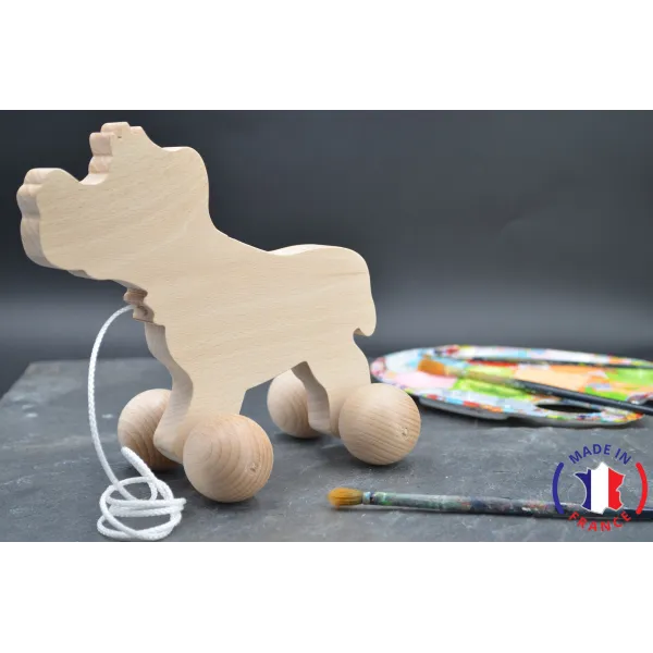 Raw wooden dog to pull.