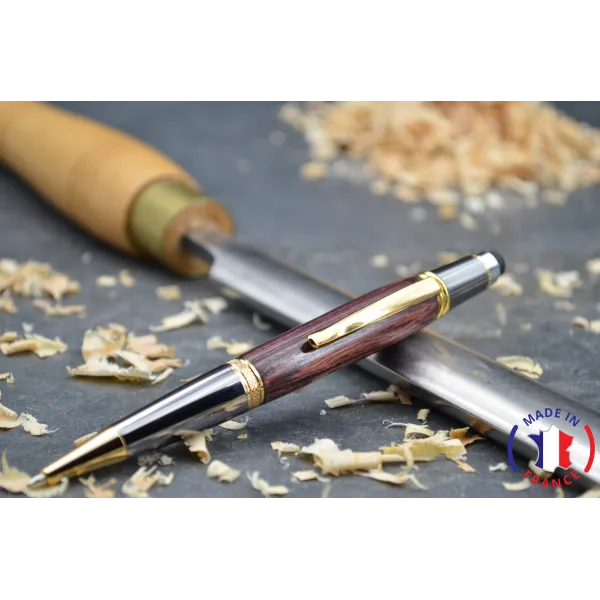 Violet wooden ballpoint pen.