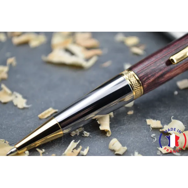 Violet wooden ballpoint pen.
