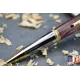 Violet wooden ballpoint pen.