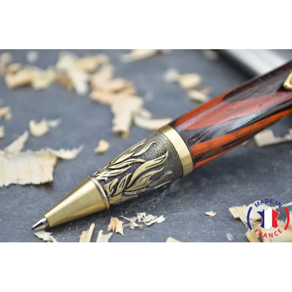Stylo bille Patricia en bois d'assemblage Padouk et d’ébène.