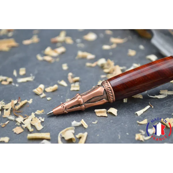 Skull wood pen made of violet wood.