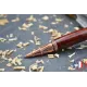 Skull wood pen made of violet wood.